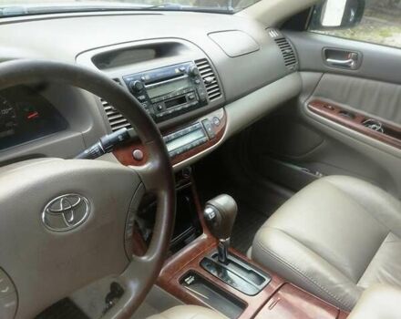 Чорний Тойота Камрі, об'ємом двигуна 3 л та пробігом 208 тис. км за 6700 $, фото 1 на Automoto.ua