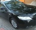 Черный Тойота Камри, объемом двигателя 2.4 л и пробегом 236 тыс. км за 7800 $, фото 1 на Automoto.ua
