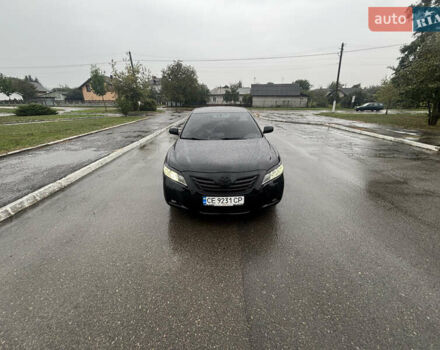 Черный Тойота Камри, объемом двигателя 3.46 л и пробегом 320 тыс. км за 6900 $, фото 1 на Automoto.ua