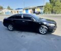 Черный Тойота Камри, объемом двигателя 2.4 л и пробегом 275 тыс. км за 7500 $, фото 2 на Automoto.ua