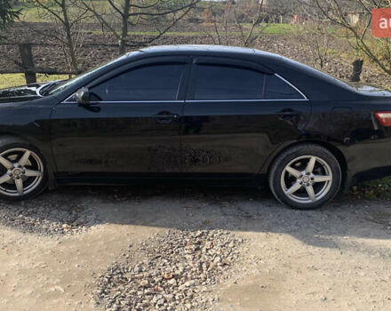 Чорний Тойота Камрі, об'ємом двигуна 2.4 л та пробігом 274 тис. км за 7500 $, фото 1 на Automoto.ua