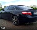 Черный Тойота Камри, объемом двигателя 3.5 л и пробегом 323 тыс. км за 9200 $, фото 1 на Automoto.ua