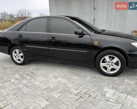 Чорний Тойота Камрі, об'ємом двигуна 2.36 л та пробігом 294 тис. км за 5100 $, фото 5 на Automoto.ua