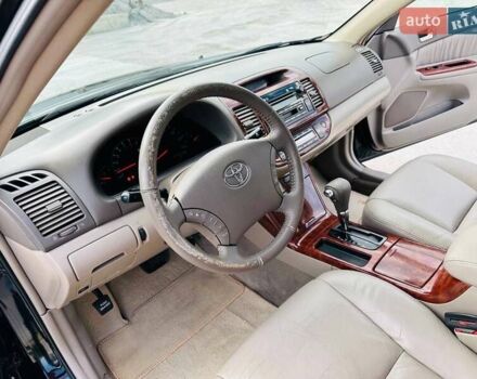 Черный Тойота Камри, объемом двигателя 3 л и пробегом 195 тыс. км за 6900 $, фото 21 на Automoto.ua