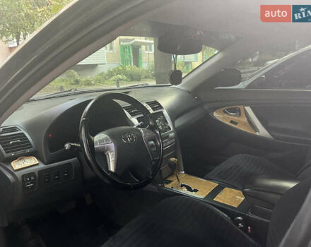 Черный Тойота Камри, объемом двигателя 2.4 л и пробегом 249 тыс. км за 9700 $, фото 16 на Automoto.ua