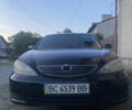 Чорний Тойота Камрі, об'ємом двигуна 2.4 л та пробігом 240 тис. км за 3450 $, фото 2 на Automoto.ua