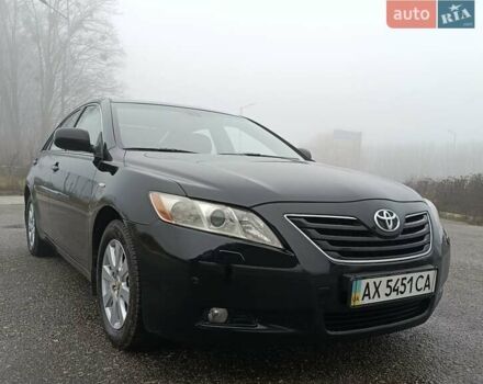 Черный Тойота Камри, объемом двигателя 3.46 л и пробегом 169 тыс. км за 10300 $, фото 1 на Automoto.ua