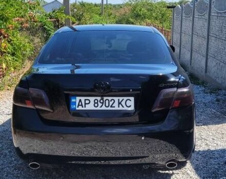 Черный Тойота Камри, объемом двигателя 3.5 л и пробегом 300 тыс. км за 7500 $, фото 1 на Automoto.ua