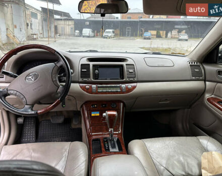 Чорний Тойота Камрі, об'ємом двигуна 2.36 л та пробігом 294 тис. км за 5100 $, фото 13 на Automoto.ua