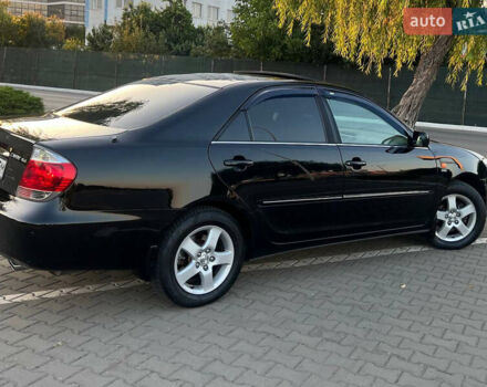 Черный Тойота Камри, объемом двигателя 2.36 л и пробегом 230 тыс. км за 6300 $, фото 4 на Automoto.ua