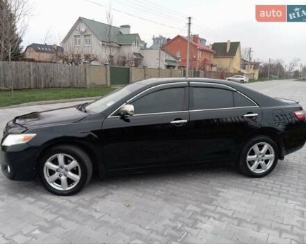 Чорний Тойота Камрі, об'ємом двигуна 2.4 л та пробігом 288 тис. км за 7700 $, фото 2 на Automoto.ua