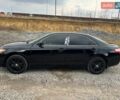Черный Тойота Камри, объемом двигателя 3.46 л и пробегом 234 тыс. км за 8800 $, фото 1 на Automoto.ua