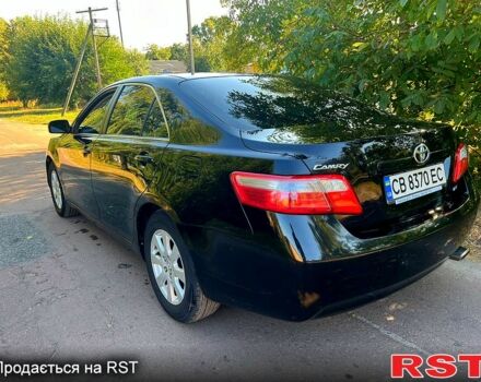 Чорний Тойота Камрі, об'ємом двигуна 2.4 л та пробігом 380 тис. км за 7499 $, фото 5 на Automoto.ua