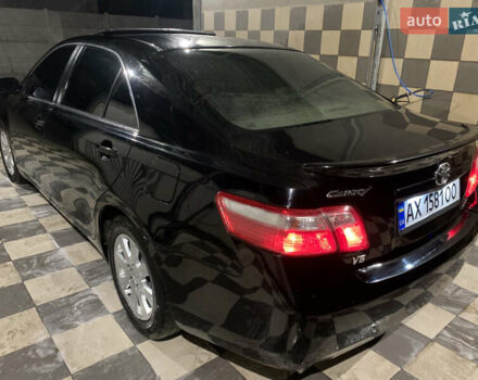 Черный Тойота Камри, объемом двигателя 3.5 л и пробегом 325 тыс. км за 7999 $, фото 70 на Automoto.ua