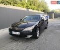 Черный Тойота Камри, объемом двигателя 2.4 л и пробегом 313 тыс. км за 7200 $, фото 1 на Automoto.ua