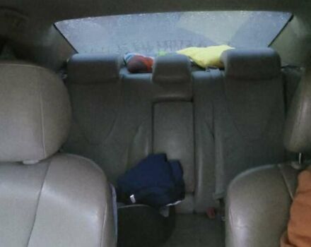 Черный Тойота Камри, объемом двигателя 2.36 л и пробегом 230 тыс. км за 10000 $, фото 28 на Automoto.ua