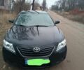 Чорний Тойота Камрі, об'ємом двигуна 2.4 л та пробігом 260 тис. км за 8000 $, фото 1 на Automoto.ua