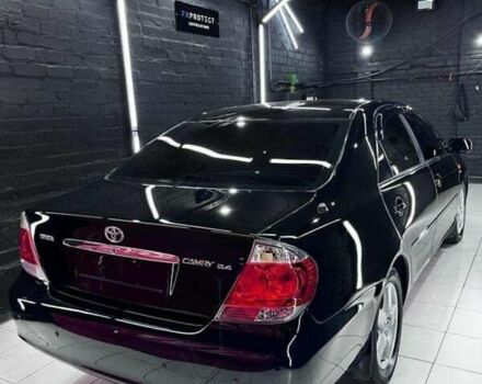 Чорний Тойота Камрі, об'ємом двигуна 2.36 л та пробігом 270 тис. км за 6100 $, фото 2 на Automoto.ua