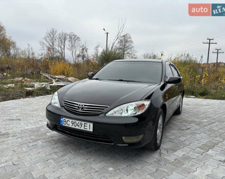 Чорний Тойота Камрі, об'ємом двигуна 2.36 л та пробігом 294 тис. км за 5100 $, фото 1 на Automoto.ua
