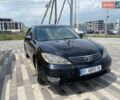 Черный Тойота Камри, объемом двигателя 2.36 л и пробегом 330 тыс. км за 6000 $, фото 1 на Automoto.ua