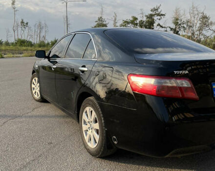 Черный Тойота Камри, объемом двигателя 2.4 л и пробегом 249 тыс. км за 9700 $, фото 11 на Automoto.ua