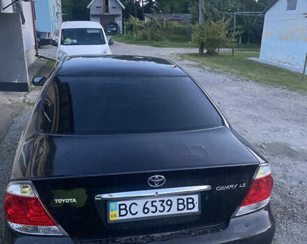 Чорний Тойота Камрі, об'ємом двигуна 2.4 л та пробігом 240 тис. км за 3450 $, фото 9 на Automoto.ua