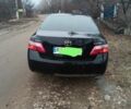 Чорний Тойота Камрі, об'ємом двигуна 2.4 л та пробігом 260 тис. км за 8000 $, фото 1 на Automoto.ua