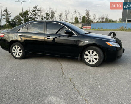 Черный Тойота Камри, объемом двигателя 2.4 л и пробегом 249 тыс. км за 9700 $, фото 1 на Automoto.ua