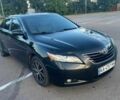 Чорний Тойота Камрі, об'ємом двигуна 2.4 л та пробігом 283 тис. км за 5510 $, фото 1 на Automoto.ua
