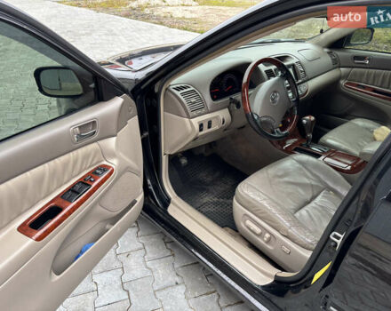 Чорний Тойота Камрі, об'ємом двигуна 2.36 л та пробігом 294 тис. км за 5100 $, фото 10 на Automoto.ua