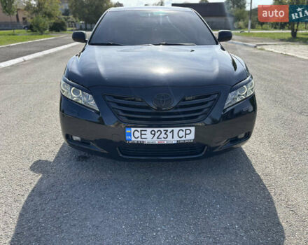Черный Тойота Камри, объемом двигателя 3.46 л и пробегом 320 тыс. км за 6350 $, фото 1 на Automoto.ua