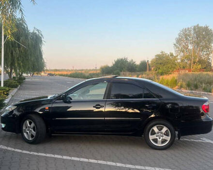 Черный Тойота Камри, объемом двигателя 2.36 л и пробегом 230 тыс. км за 6300 $, фото 3 на Automoto.ua