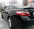 Чорний Тойота Камрі, об'ємом двигуна 2.4 л та пробігом 288 тис. км за 7700 $, фото 3 на Automoto.ua