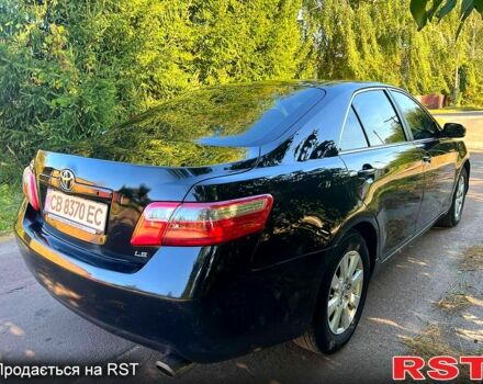Чорний Тойота Камрі, об'ємом двигуна 2.4 л та пробігом 380 тис. км за 7499 $, фото 4 на Automoto.ua