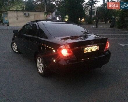 Чорний Тойота Камрі, об'ємом двигуна 2.36 л та пробігом 270 тис. км за 6100 $, фото 3 на Automoto.ua