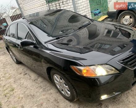 Черный Тойота Камри, объемом двигателя 3.5 л и пробегом 325 тыс. км за 7999 $, фото 1 на Automoto.ua