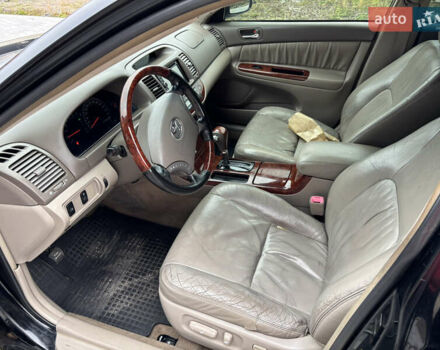 Чорний Тойота Камрі, об'ємом двигуна 2.36 л та пробігом 294 тис. км за 5100 $, фото 11 на Automoto.ua