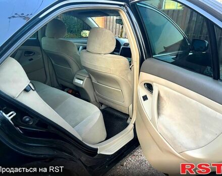 Чорний Тойота Камрі, об'ємом двигуна 2.4 л та пробігом 380 тис. км за 7499 $, фото 2 на Automoto.ua