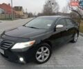 Чорний Тойота Камрі, об'ємом двигуна 2.4 л та пробігом 288 тис. км за 7700 $, фото 1 на Automoto.ua