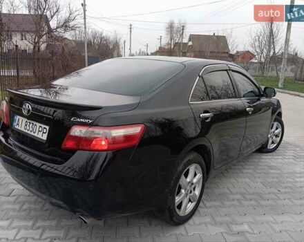 Чорний Тойота Камрі, об'ємом двигуна 2.4 л та пробігом 288 тис. км за 7700 $, фото 5 на Automoto.ua