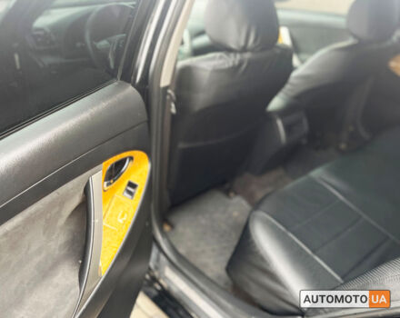 Черный Тойота Камри, объемом двигателя 2.4 л и пробегом 384 тыс. км за 9200 $, фото 21 на Automoto.ua