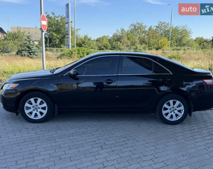 Черный Тойота Камри, объемом двигателя 3.46 л и пробегом 325 тыс. км за 7150 $, фото 3 на Automoto.ua