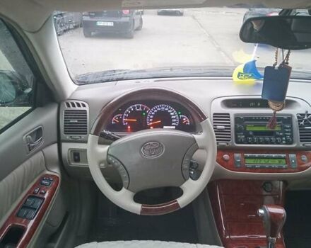 Чорний Тойота Камрі, об'ємом двигуна 2.36 л та пробігом 270 тис. км за 6100 $, фото 11 на Automoto.ua