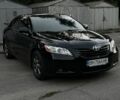 Черный Тойота Камри, объемом двигателя 2.4 л и пробегом 250 тыс. км за 7294 $, фото 1 на Automoto.ua