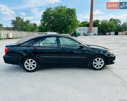 Черный Тойота Камри, объемом двигателя 3 л и пробегом 195 тыс. км за 6900 $, фото 1 на Automoto.ua