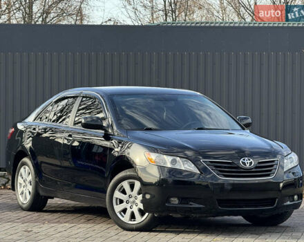 Черный Тойота Камри, объемом двигателя 2.36 л и пробегом 249 тыс. км за 8950 $, фото 1 на Automoto.ua