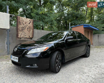 Черный Тойота Камри, объемом двигателя 2.36 л и пробегом 300 тыс. км за 7600 $, фото 1 на Automoto.ua