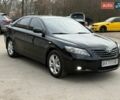 Черный Тойота Камри, объемом двигателя 2.36 л и пробегом 267 тыс. км за 7999 $, фото 1 на Automoto.ua