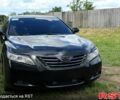Черный Тойота Камри, объемом двигателя 2.4 л и пробегом 330 тыс. км за 7800 $, фото 1 на Automoto.ua