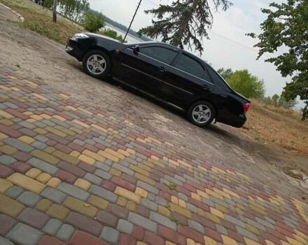 Чорний Тойота Камрі, об'ємом двигуна 2.36 л та пробігом 270 тис. км за 6100 $, фото 8 на Automoto.ua